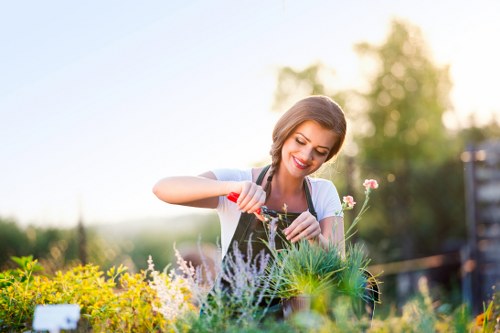 Gardeners World Team members working together in a lush garden